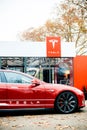 New Tesla Model S showroom parked in front of the red showroom Royalty Free Stock Photo