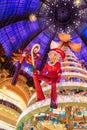 The Christmas tree and the Elf at Galeries Lafayette Haussmann Royalty Free Stock Photo