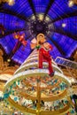 The Christmas tree and the Elf at Galeries Lafayette in Paris, France Royalty Free Stock Photo