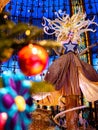 The Lady Star on top of the Christmas tree at Galeries Lafayette in Paris, France Royalty Free Stock Photo