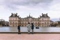 Paris, France - November 05 2021: Luxembourg Palace on the background of the company of children