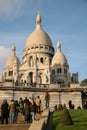PARIS, FRANCE - NOVEMBER 27, 2009: Tourists near the Basilica of the Sacred Heart of Paris