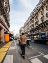 Man on electric scooter in France