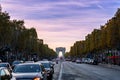 Scene at Avenue de Champs Elysee in Paris, France with the Arc de Triomphe Royalty Free Stock Photo