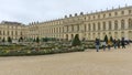 Scenic view of Gardens of Versailles Palace on a cloudy day in Paris, France