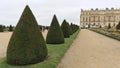 Scenic view of Gardens of Versailles Palace on a cloudy day in Paris, France