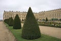 Scenic view of Gardens of Versailles Palace on a cloudy day in Paris, France