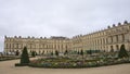 Scenic view of Gardens of Versailles Palace on a cloudy day in Paris, France