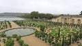 Scenic view of Gardens of Versailles Palace on a cloudy day in Paris, France