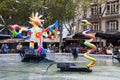 The Stravinsky Fountain with colorful whimsical sculptures spraying water in Paris