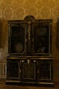 Vertical shot of an antique furniture at the Versailles palace, Paris, France Royalty Free Stock Photo