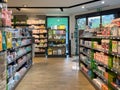 Wide view over modern French drug store interior with multiple shelves and drugs Royalty Free Stock Photo