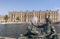 PARIS, FRANCE - OCTOBER, 15, 2017: close up of a bronze statue beside a chateau versailles fountain in paris