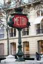 the famous Metropolitan sign in the subway sation entry in the street