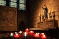 Paris, France - October 28, 2018: Interior of Notre Dame de Paris cathedral. Small altar with ancient statue and stained glass Royalty Free Stock Photo