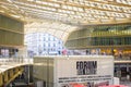 A vast glass canopy covers the patio of the Forum des Halles underground shopping mall in Paris