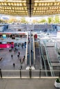 The patio of the Forum des Halles underground shopping mall in Paris is covered by a vast glass canopy