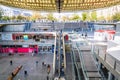 The patio of the Forum des Halles underground shopping mall in Paris is covered by a vast glass canopy