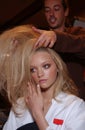 Model Gemma Ward getting ready backstage for fashion show of Valentino Ready-To-Wear collection