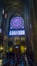 PARIS, FRANCE - OCTOBER 17, 2016: Notre Dame de Paris Cathedral, Interior view of columns and stained glass of the Cathedral Royalty Free Stock Photo