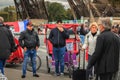 Rickshaw drivers wait for customers next to the Eiffel Tower