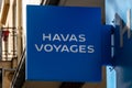 Sign and logo of a Havas Voyages travel agency, Paris, France