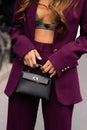 Paris, France - October, 1, 2022: woman influencer wearing Mini Kelly or Micro Kelly bag from Hermes. Fashion blogger