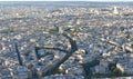 Parisian cityscape at sunset from Tour Eiffel with Arc de Triomphe view. Paris France. Royalty Free Stock Photo