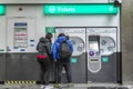 Paris, France, 09.10.2019: People buy a ticket on the subway at the terminal on the street Royalty Free Stock Photo