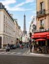 Paris France people drinking coffee on the terrace of a cafe restaurant during the Autumn Royalty Free Stock Photo