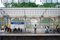 Paris, France - people wait for the next train at La Chapelle metro station platform Royalty Free Stock Photo