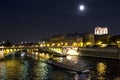 Paris, The RIver Seine with the boats illuminated at night Royalty Free Stock Photo