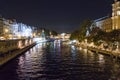 Paris, The RIver Seine with the boats illuminated at night Royalty Free Stock Photo