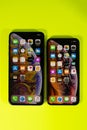 Apple iPhone Xs Max against vibrant background compare