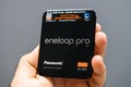 Man hand holding Panasonic Eneloop