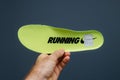 POV male hand holding sport shoe running sole from Nike Sport Wear