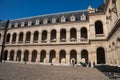 Courtyard at Hotel les Invalides Invalids Residence and the Army Museum with tourists and cannons