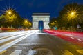 Paris, France - September 15, 2018: Arc de Triomphe Triumphal Arch in Champs Elysees at night, Paris, France with traffic abstract Royalty Free Stock Photo