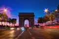 Dramatic night view of the stunning Arc de Triomphe in Paris Royalty Free Stock Photo