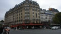 French people walking beside road and traffic road front of Gare de Paris-Est or Paris Gare de l`est railway station of Paris Metr