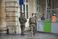 French soldier walking patrol and checking safety around at Gare de Paris-Est or Paris Gare de l`est railway station Royalty Free Stock Photo