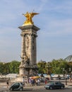 Gilded Fames Sculptures on the Socle Counterweights of Alexandre III Bridge Royalty Free Stock Photo