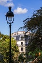 PARIS - September 3, 2019 : Haussmann building view from the Buttes-Chaumont Park Royalty Free Stock Photo