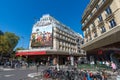 Lacoste advertising billboard covering the facade of the Galeries Lafayette, Paris, France