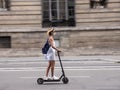 PARIS, FRANCE - SEPTEMBER 03, 2020: More people use the bike or the Electric Scooter to get around town