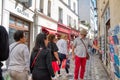 People sightseeing on a street in the picturesque Montmartre district, in Paris Royalty Free Stock Photo