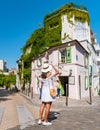 Streets of Montmartre Paris France in the early morning with cafes and restaurants, La Maison Rose