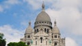 Paris, France - exterior of Sacre-Coeur minor basilica. Sacred Heart church up Montmartre hill. Panorama of city landmark. Royalty Free Stock Photo