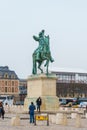 Paris, France - 19.01.2019: Statue of Louis XIV in front of the Versailles palace near Paris Royalty Free Stock Photo