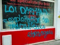 Paris, France, Street Graffitti on Shop Front Against French Government anti-immigration Politics, 2023